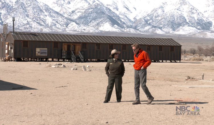 Superintendent Bernadette Johnson walks with Doug McConnell at Manzanar