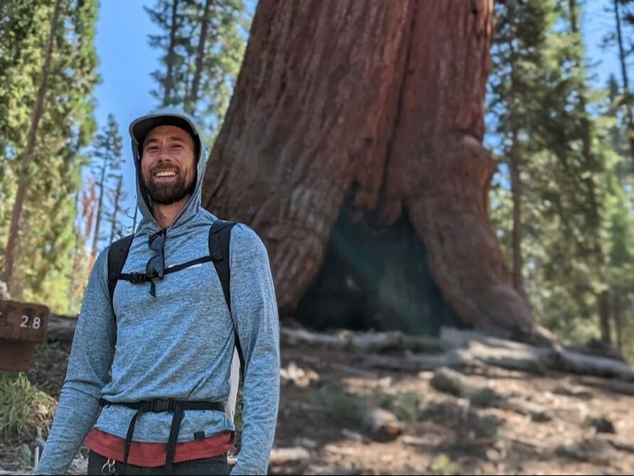 Kevin Hendricks stands on a mountain pass in the Sierra Nevadas