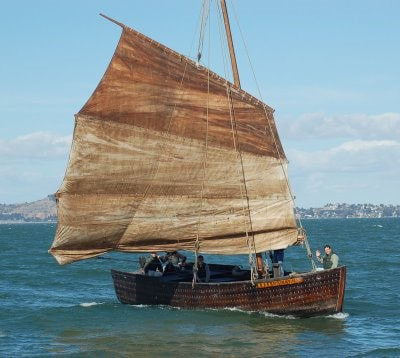 A Chinese junk ship sails on the ocean