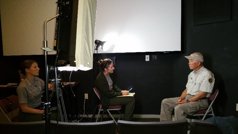 Rangers conduct an oral history interview with a former incarceree of Manzanar
